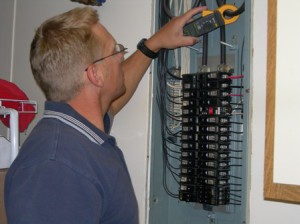 electrical panel with technician